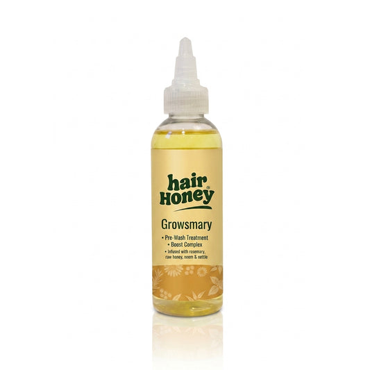G&T Pre-Wash Oil for Nutrient-Deprived Hair in a sleek bottle on a wooden surface.