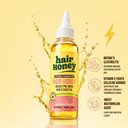 Close-up of Hair Syrup Watermelon Oil - Pre-Wash Treatment for Dry Hair showcasing its vibrant packaging.